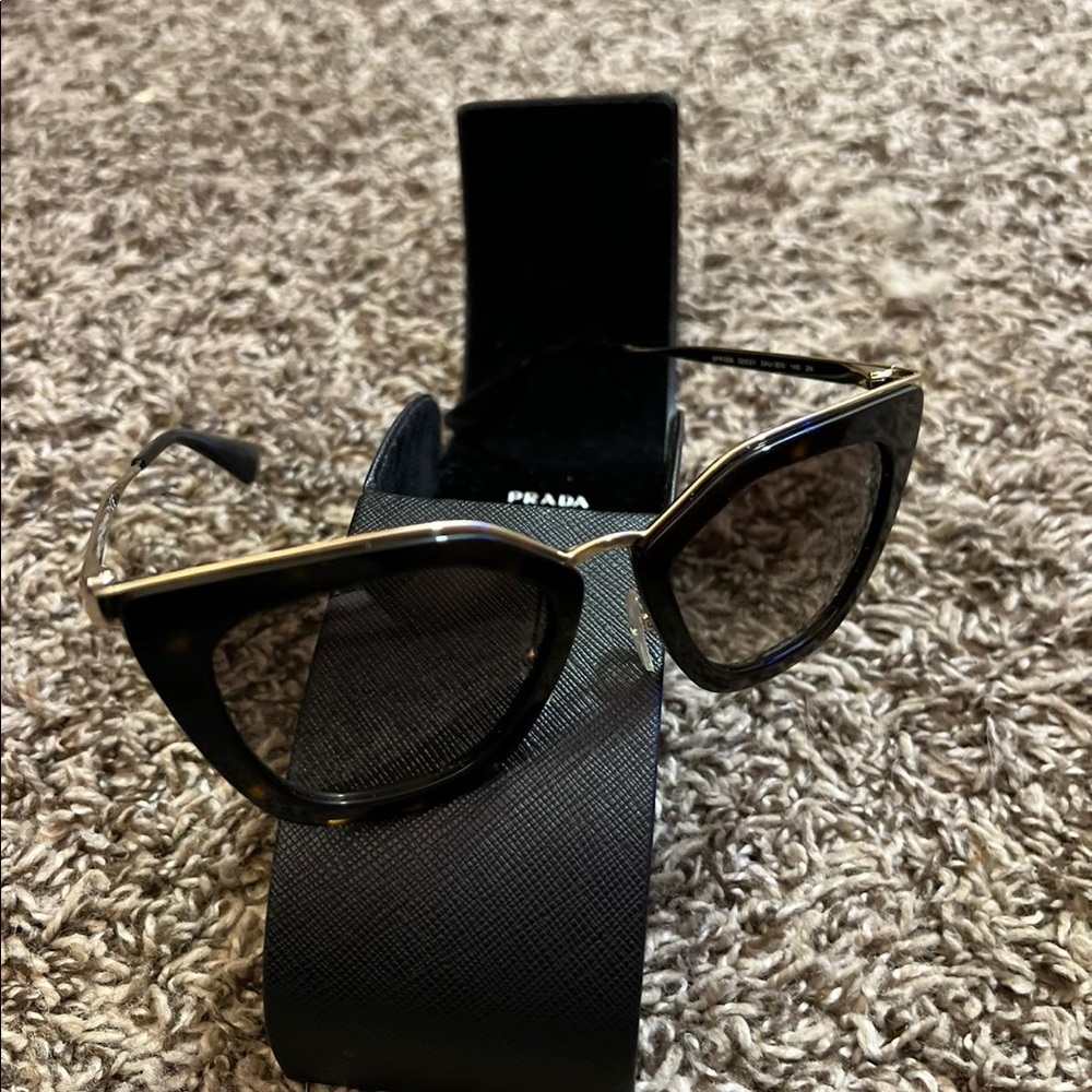 Prada black and gold sunglasses
